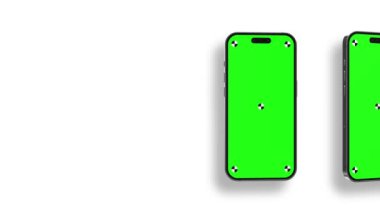 Akıllı telefonun göstergeli boş yeşil ekranı çerçeveye doğru dönüyor. Luma mat, arka plan değişikliği için dahil. Modern çerçevesiz tasarım, hareket bulanıklığı yok ve odaklanma