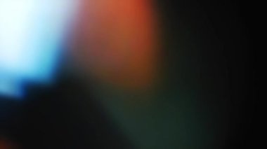 Hafif organik sızıntılar arka plan animasyon stok görüntülerini etkiler. Mercek ışığı etrafta yanıp sönüyor ve soyut bir arka plan animasyonu oluşturuyor. 4K 'da Klasik Işık Sızıntısı