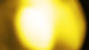 Hafif organik sızıntılar arka plan animasyon stok görüntülerini etkiler. Mercek ışığı etrafta yanıp sönüyor ve soyut bir arka plan animasyonu oluşturuyor. 4K 'da Klasik Işık Sızıntısı