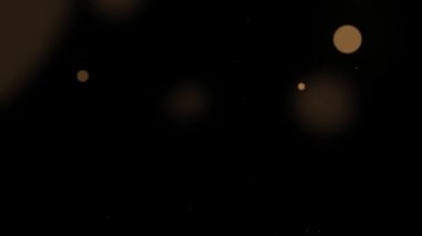 Kara Arkaplan 'daki Altın Parçacıklar - Yıldızlı Parıldayan Parçacıklar, Bokeh Parlak Parçacıklar Döngüsü Animasyonu