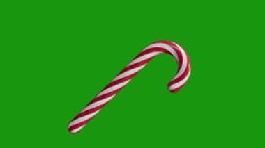 Yeşil Arkaplanda Şekerleme Çubuğu Dönüşü - Döngü Videosu Noel Kavramı