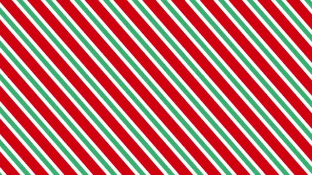 クリスマスパターン背景 お祝いの赤と白の雪片とキャンディケインストライプパターン クリスマス または新年のテンプレートに最適 ループ可能 — ストック動画