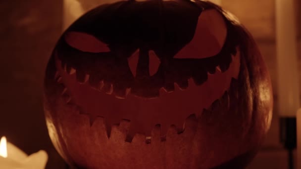 Halloween Holiday Attributes Halloween Carved Pumpkin Candles Smoke Dark Scene — Stock Video
