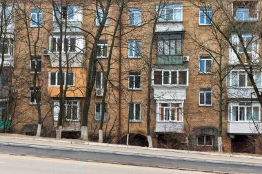 Facade of a residential building with balconies and windows in the city Kyiv. Ukraine