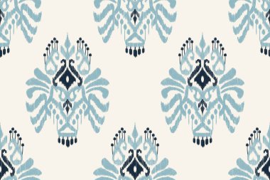 Ikat çiçekli desenli işleme.Mavi ve beyaz arka plan. Geometrik etnik doğuya özgü dikişsiz desen geleneği. Doku, kumaş, giysi, ambalaj tasarımı..