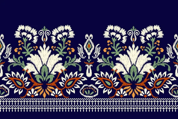 青い背景にイカットの花のペイズリー刺繍 イカットの民族的な東洋のパターンの伝統 アステカスタイル抽象的なベクトルのイラスト テクスチャ ファブリック サロン スカーフのためのデザイン — ストックベクタ