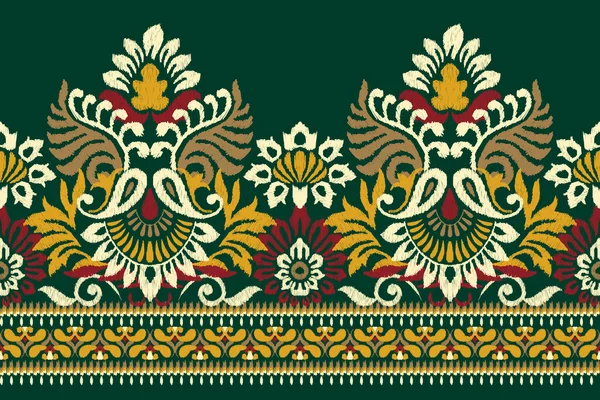 緑の背景にイカットの花のペイズリー刺繍 イカットの民族的な東洋のパターンの伝統 アステカスタイル抽象的なベクトルのイラスト テクスチャ ファブリック サロン プリントのためのデザイン — ストックベクタ