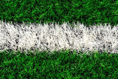Futbol sahası işaretleri. Futbol, futbol sahası. Futbol stadyumundaki çizgiler, spor arka planı. Kopyalama alanı, yakın plan.