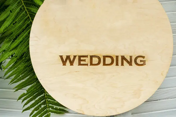 Board sign newlywed, wedding, marriage. pointing for wedding ceremony location. just married text sign. just married on wooden background