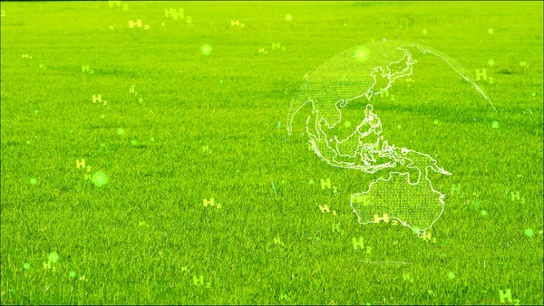 global digital and australia continent with green H2 text particles flying on green grass background,concept green hydrogen clean energy all the world