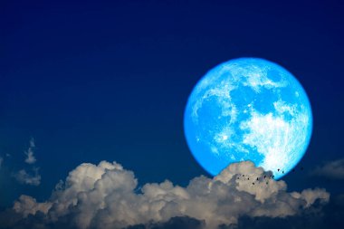 Super worm moon on the night sky back dark gray cloud, Elements of this image furnished by NASA