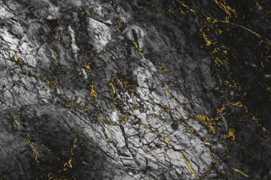 Siyah ve beyaz mermer granit taş zemin. Doku yüzeyinde altın mineral var.