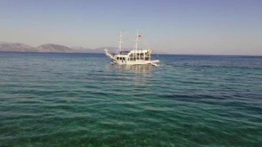 Seascape, very clean sea, resort place for relaxation. A boat in the sea
