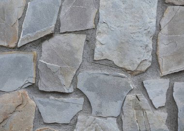 Stone background, stone wall, texture. Up close Masonry in the old style