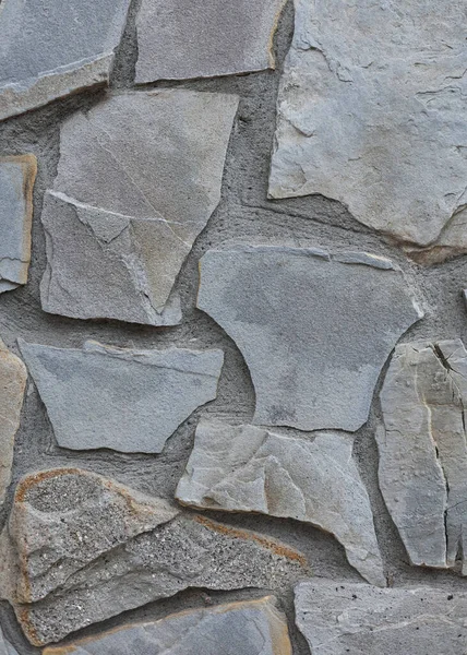 Stone background, stone wall, texture. Up close Masonry in the old style