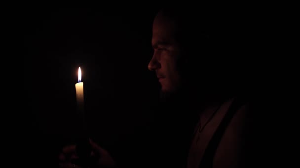 Man Burning Candle Has Many Thoughts Evening Light Ukraine — Vídeo de stock
