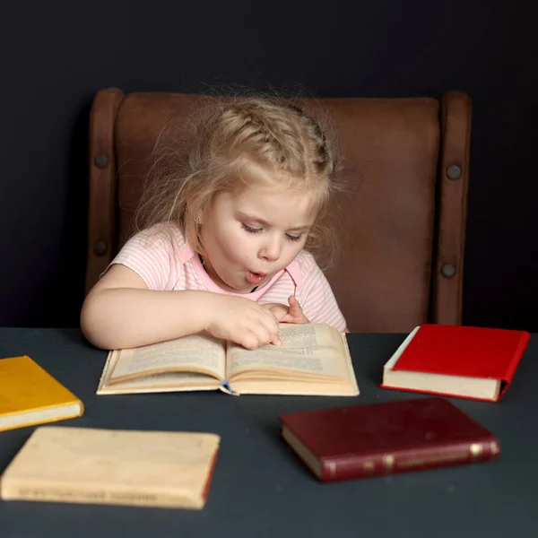 While preparing for school, the child studies at home. Distance learning, homework