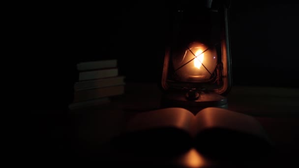 Ancient Kerosene Lamp Standing Table Book Next Darkness Black Background — Video Stock