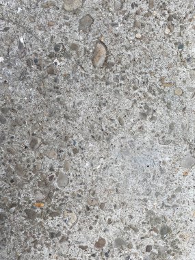 Eski betonun dokuları. Gri beton arka plan, duvar, eski levha. Üst görünüm, yakın çekim.