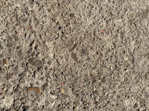 Eski betonun dokuları. Gri beton arka plan, duvar, eski levha. Üst görünüm, yakın çekim.