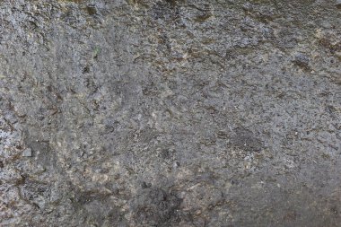 Eski betonun dokuları. Gri hasarlı beton arka plan, duvar, eski döşemeler. Üst görünüm, yakın çekim.