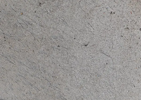 Eski betonun dokuları. Gri hasarlı beton arka plan, eski duvar. Üst görünüm, yakın çekim.