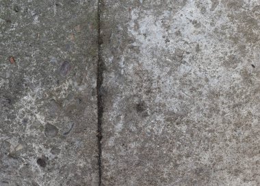 Harap olmuş beton yolun arka planı, gri beton, beton doku, yakın plan. Doğal fotoğraf. Eski beton levha