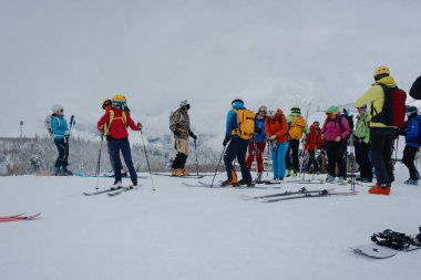 23.03.24 - Hatsvali, Svanetia in Georgia.Skiers and snowboarders at a ski resort. Winter sport. clipart
