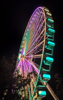 Illuminated ferris wheel in Florence 