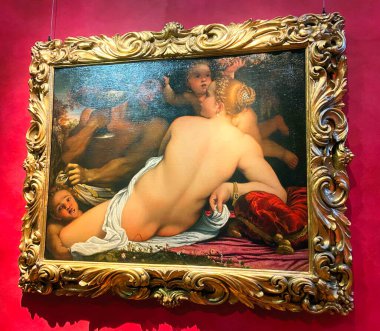 Uffizi Galerisi. Floransa. Venüs, Satyrs ve Cupids Venedik 'in etkisi altındaki İtalyan ressam Annibale Carracci' nin tablosu..
