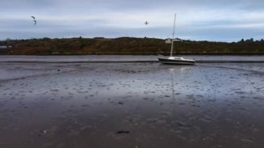 Boat Stuck on Sandbar in Low Flow River.Ireland. Cork. Aerial Drone. High quality 4k footage