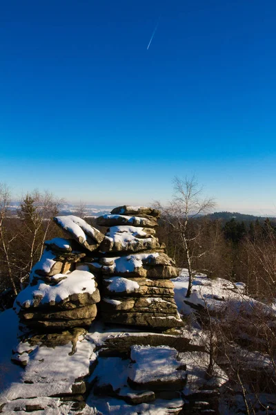 Winter landscape with rock in Czech Republic.