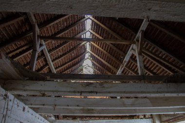 Abandoned farm with broken roof