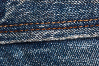 closeup texture thread and stitch denim pants