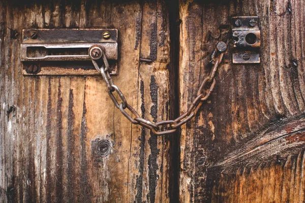 Old door, wood texture, metal latch lock