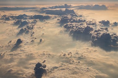 beautiful fluffy clouds from the window of the plane