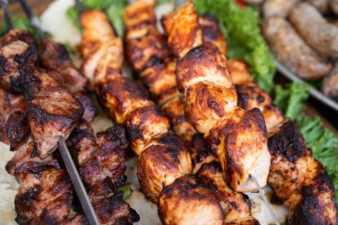 delicious and fragrant meat, skewers on grill 