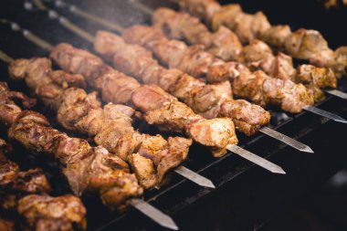delicious and fragrant meat, skewers on grill 