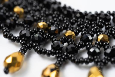 handmade colorful bead necklace close-up isolated on white background