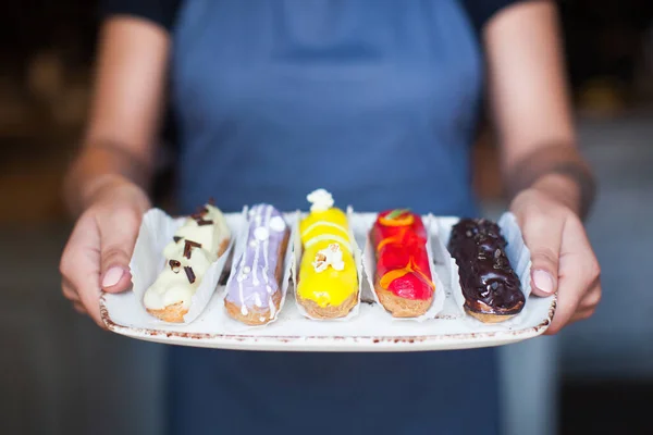 the chef cooked delicious  eclair on the tray