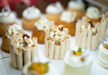 various delicious sweet pastries in the shop window