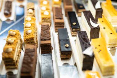 various delicious sweet pastries in the shop window