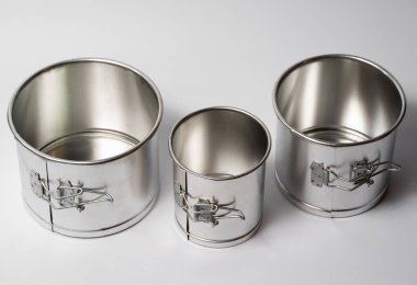 metal round forms for baking Easter for Easter in Ukraine, isolated on a white background