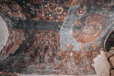 A cave church in Cappadocia with inscriptions on the walls, frescoes from the beginning of Christianity