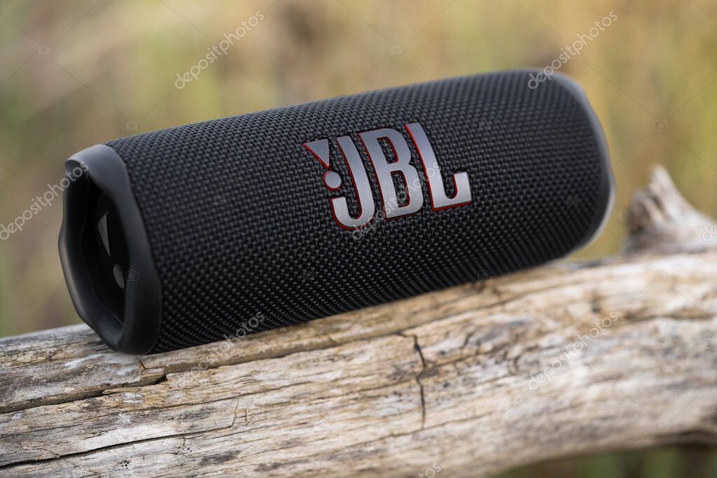 LVIV, UKRAINE - SEPTEMBER 8, 2023: JBL Flip 6 Black, portable bluetooth speaker on outdoors