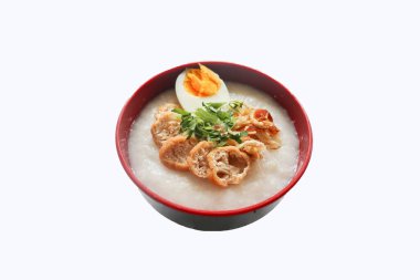 congee porridge with chicken slice, tofu, egg. congee porridge from hong kong. chinese food