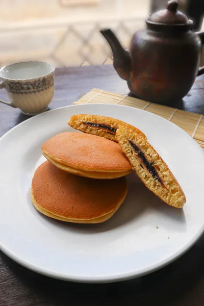 Dorayaki. Japanese bean paste pancake on a white background. Dorayaki is a cake that comes from Japan