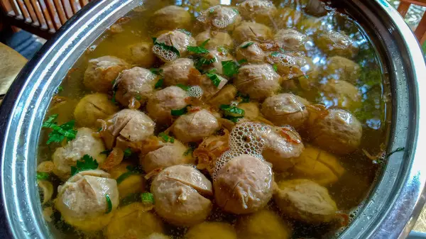 Bakso urat or meatball muscles is popular traditional food made from meat and cow muscles served with vegetables, noodle and flavour soup served on bowl