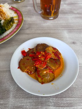 Sambal Jengkol or Jering or Jariang, or dogfruit sauce, Archidendron pauciflorum, A. jiringa. Traditional cuisine from Java and Sumatra. The fruit is fried and then served with spicy sauce clipart