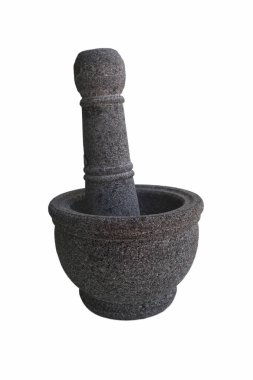 Büyük bir havan topu ve tokmak beyaz bir zeminde oturur. Havan topu taş saptan yapılmış. Gelenek ve zanaat kavramı